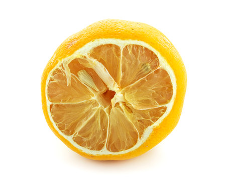 Dried cut lemon on a white backgroundの写真素材