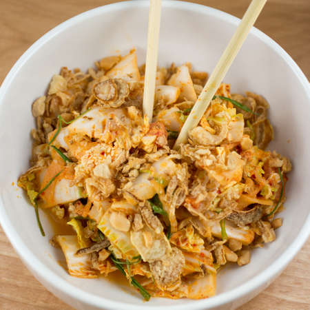 Sweet &amp; Sour.
Creamy Kimchi Dressing, Nappa Cabbage, Pickled Melon and Cashewの写真素材