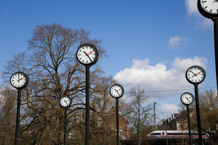 A group of clocks on the streets of the city of Dusseldorf, Germanyの写真素材
