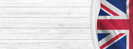 United Kingdom flag painted on old wood plank backgroundの写真素材