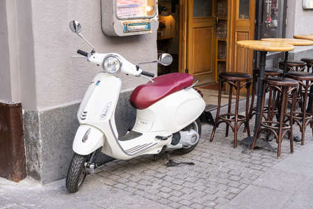 Scooters are parked on the city street in Rome, Italy. high quality photoの写真素材