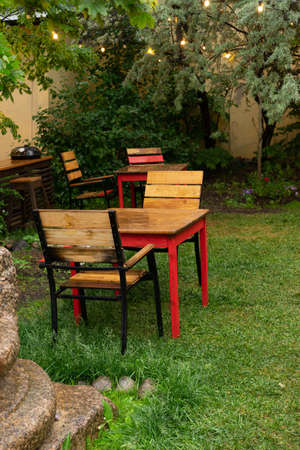 Wooden tables and chairs. Interior of the cafe.の写真素材