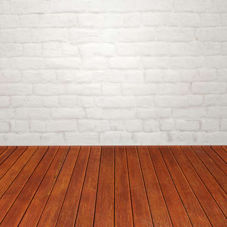 Old white brick wall and wood floor.の写真素材
