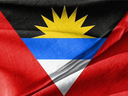 Waved Textured The flag of antigua Symbolizing National Identity and Unityの写真素材