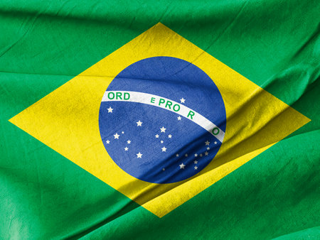 Brazilian National Flag with Green, Yellow, and Blue Colors Vibrantly Displayedの写真素材