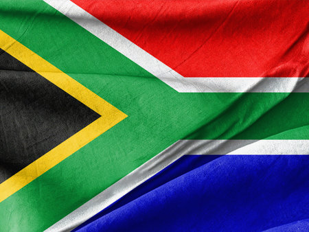 Waved Textured A close up of a flag of south africa on a plain cloth Symbolizing National Identity and Unityの写真素材