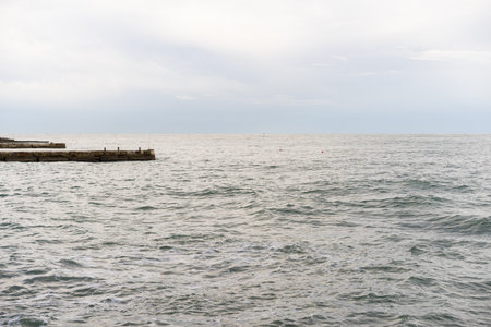 Dramatic Cloudy Skies Over Open Landscapesの写真素材