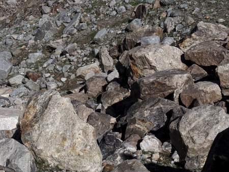 Big gray stones. Grey stones and rocks texture background. Stone surface. Abstract background textured of many granite rough stones. Filled frame picture.の写真素材