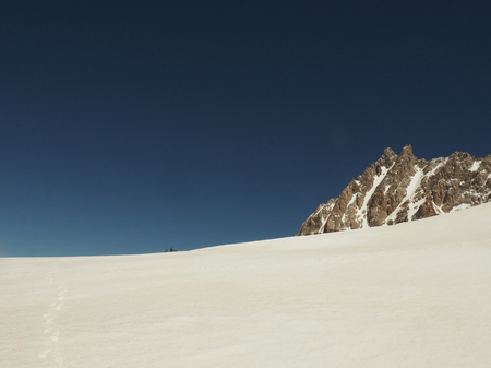 Snowy pass against the sky, Caucasus, Kabardino-Balkaria, Bezengi regionの写真素材