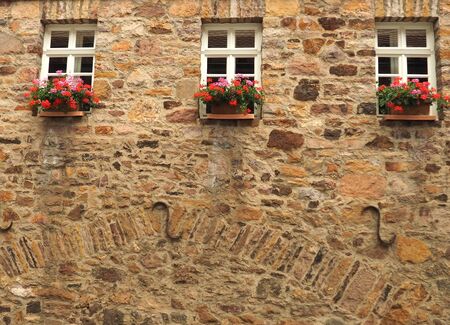 Flowers on a traditional german timber frame houseの写真素材