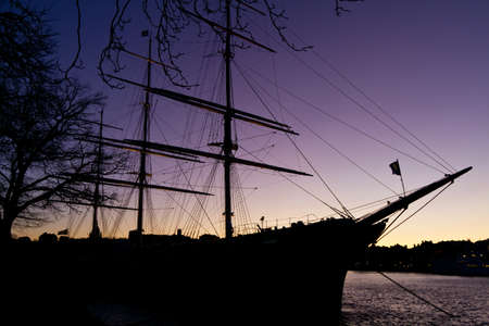 Silhouette of sailing vessel  in night sky.の写真素材