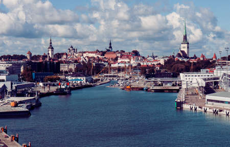 Vintage tinted snapshot of the Old Town and sea harbor in Tallinn, Estonia. Talinn sityscapeの写真素材