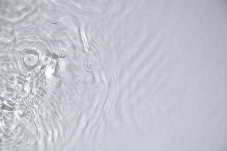 ripply water on white backgroundの写真素材