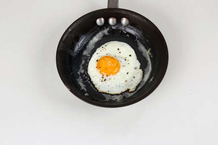 Fried Egg with Cracked Pepper and Salt