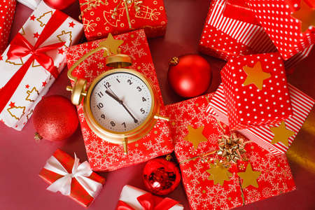 Christmas  big red gift box with red alarm clock - last minute christmas shopping