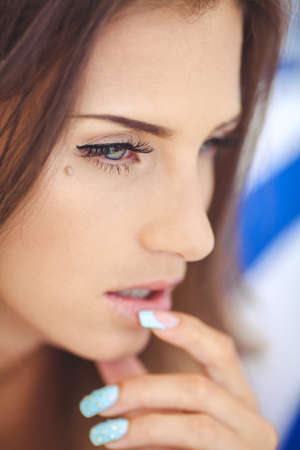 beautiful and fashionable young model woman  close up portraitの写真素材