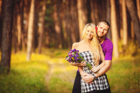 Happy young couple in love at the park の写真素材