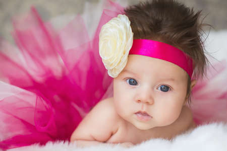 Portrait of very sweet little baby girlの写真素材