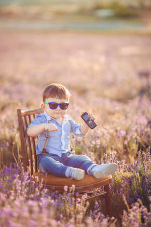 Little boy in lavender field  Outdoor summer portrait の写真素材