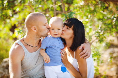 happy family having fun outdoorsの写真素材