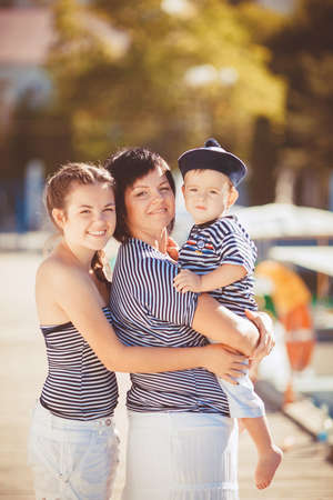 happy young family have fun and live healthy lifestyle on beach