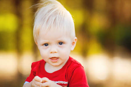 Baby boy outdoors  Close up portraitの写真素材