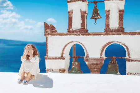 Very cute little princess outdoors in city streetの写真素材