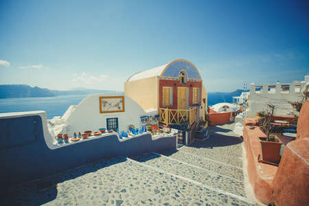 Typical and amazing colorful street in Oia city, Santorini, Greeceの写真素材