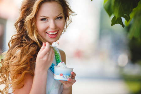 Portrait of beautiful young happy smiling womanの写真素材