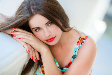 Portrait Of Young Smiling Beautiful Woman outdoors.