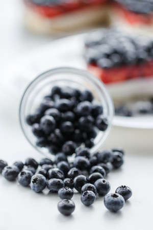 Blueberries for blueberry pie on the kitchen table.の写真素材