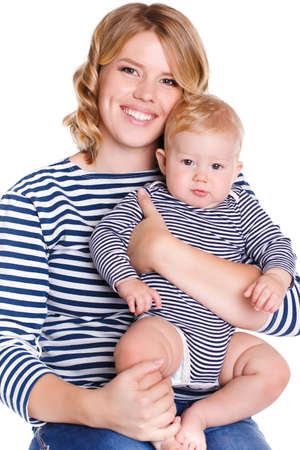 Mother with little baby isolated on white background, young beautiful mom hugging son, pretty brunet...