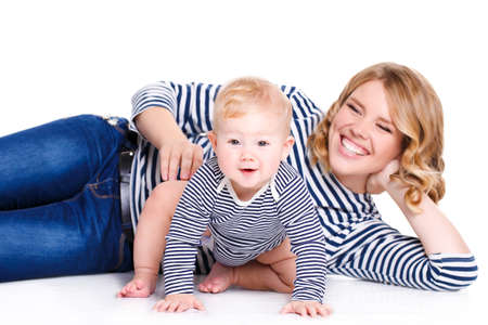 happy mother and her child with red heart, isolated against white background. childhood, parenting...