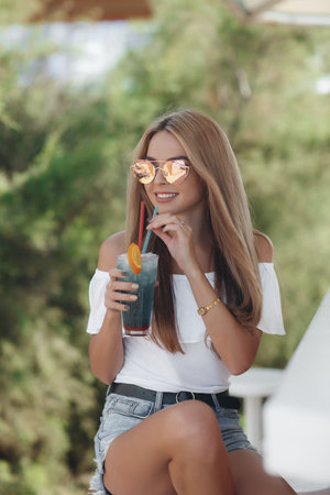 Portrait dreamy and air attractive young woman being playful and carefree with beautiful smile on...