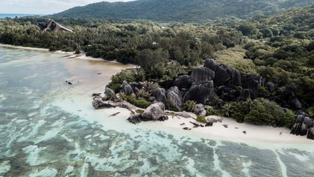 Aerial shot from drone. Top view on the rocky ocean shore. Volcanic beach of Tropical Island Oahu...