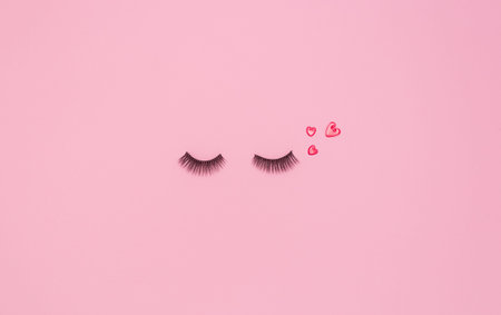 Artificial eyelashes for makeup and red hearts