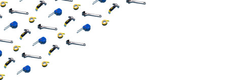 Hammers, electrical tape and measuring tape on a white background, pattern, hard shadows. Construction tools, repairs. Background for the design, copyspace.の写真素材