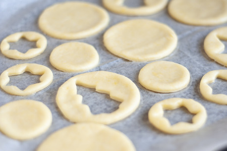 Cooking homemade Christmas cookies. Cutting out dough.の写真素材