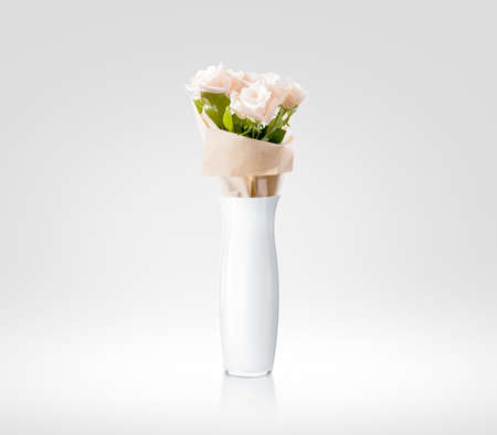 Blank white vase with flowers bouquet design mockupの写真素材