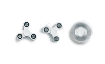 Blank white fidget spinner mockup, static and spin, top view, 3d rendering. Clear spinning toy mock up, front design template. Empty stress reliever tri-spinner. Trend device for branding or printingの写真素材
