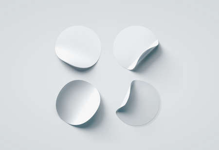 Blank white round adhesive stickers mock up set with curved corners, 3d rendering. Empty circle sticky label mockup with curl. Clear adherent tag template for glass door or wall.の写真素材