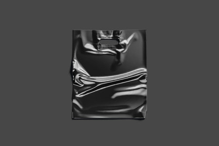 Blank black die-cut plastic bag handle hole mockup, dark background