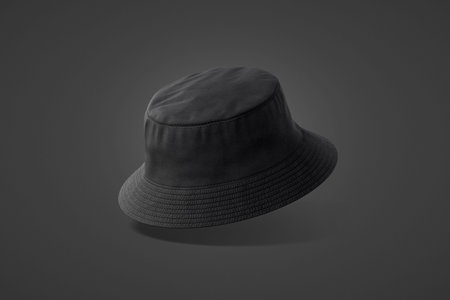 Blank black bucket hat mockup, no gravity, 3d rendering. Empty jungle or safari fabric headdress mock up, dark background. Clear denim or textile panama for summer travel template.の写真素材