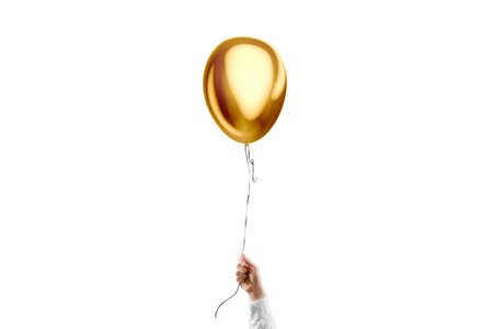 Hand holding blank gold round balloon mockup, isolatedの写真素材