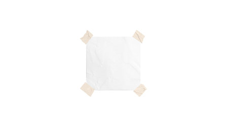 Blank white taped paper note folded mockup, depth of fieldの写真素材