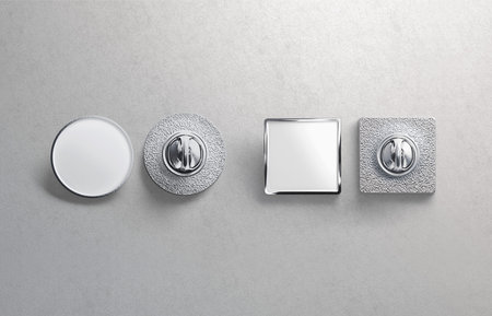 Blank white metal round and square enamel pin mockup, gray backgroundの写真素材