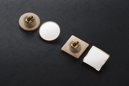 Blank white gold round and square enamel pin mockup, dark backgroundの素材