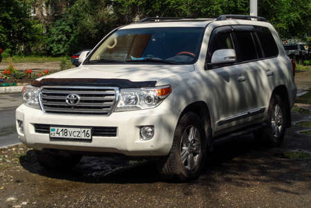 Kazakhstan, Ust-Kamenogorsk, june 19, 2020: Luxury offroad vehicle Toyota Land Cruiser 200. White japanese SUVのeditorial素材