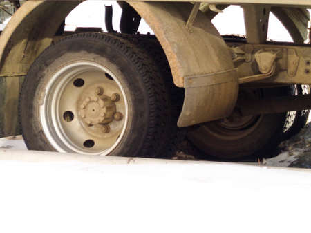The wheels of the russian light truck Gazelle close-up. Undercarriage of the truck. Automotive background. Auto fragmentのeditorial素材