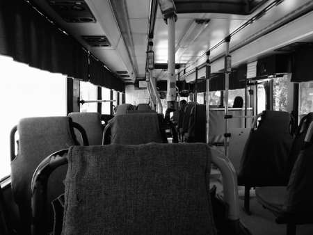 Second-hand European Scania bus inside. Interior of a city bus. Old Scania bus. Black and whiteのeditorial素材